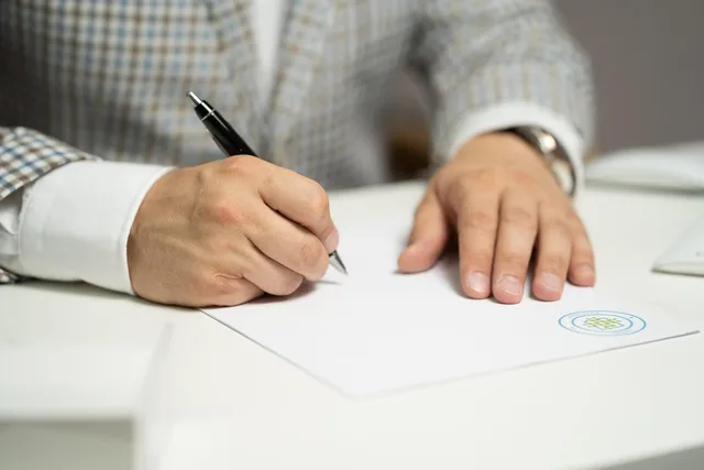 man, sign, paper, write, document, contract, signing, agreement, signature, signing document, signing contract, signing paper, sign, contract, contract, contract, contract, contract, signing, agreement, signature, signature. How to apply sales enablement rules and ethics across UK content